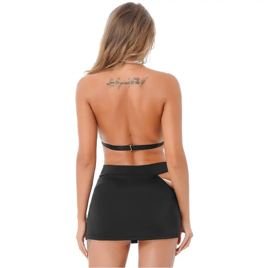 woman wearing black and white executive fantasy officewear lingerie set with mini skirt and tie detail