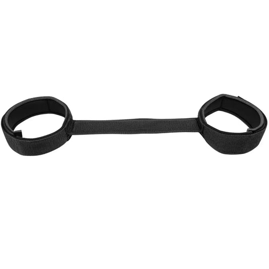 Black adjustable thigh restraint strap with flexible connector and padded leg cuffs.