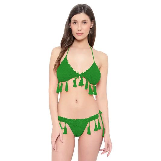 Handmade crochet bikini set with tassel tie detailing and boho beachwear styling.