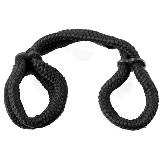 Black wide nylon ankle cuffs connected by an adjustable restraint strap.