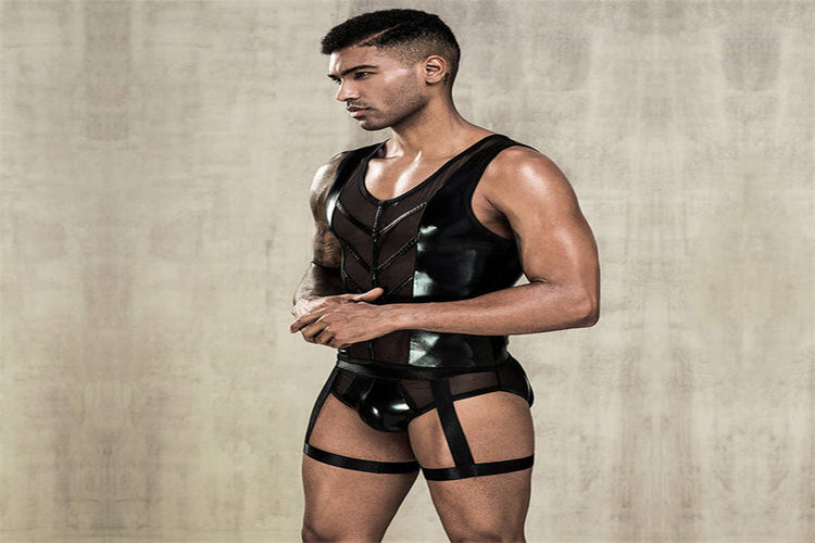 Men's black floral lace boxer briefs featuring a reinforced contour pouch and a soft elastic waistband.