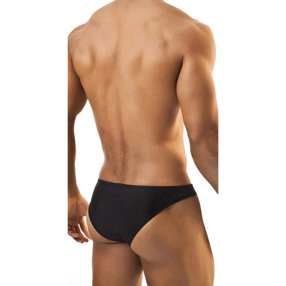 Model wearing premium men's low-rise bikini briefs in sleek black stretch fabric for a comfortable and modern fit.