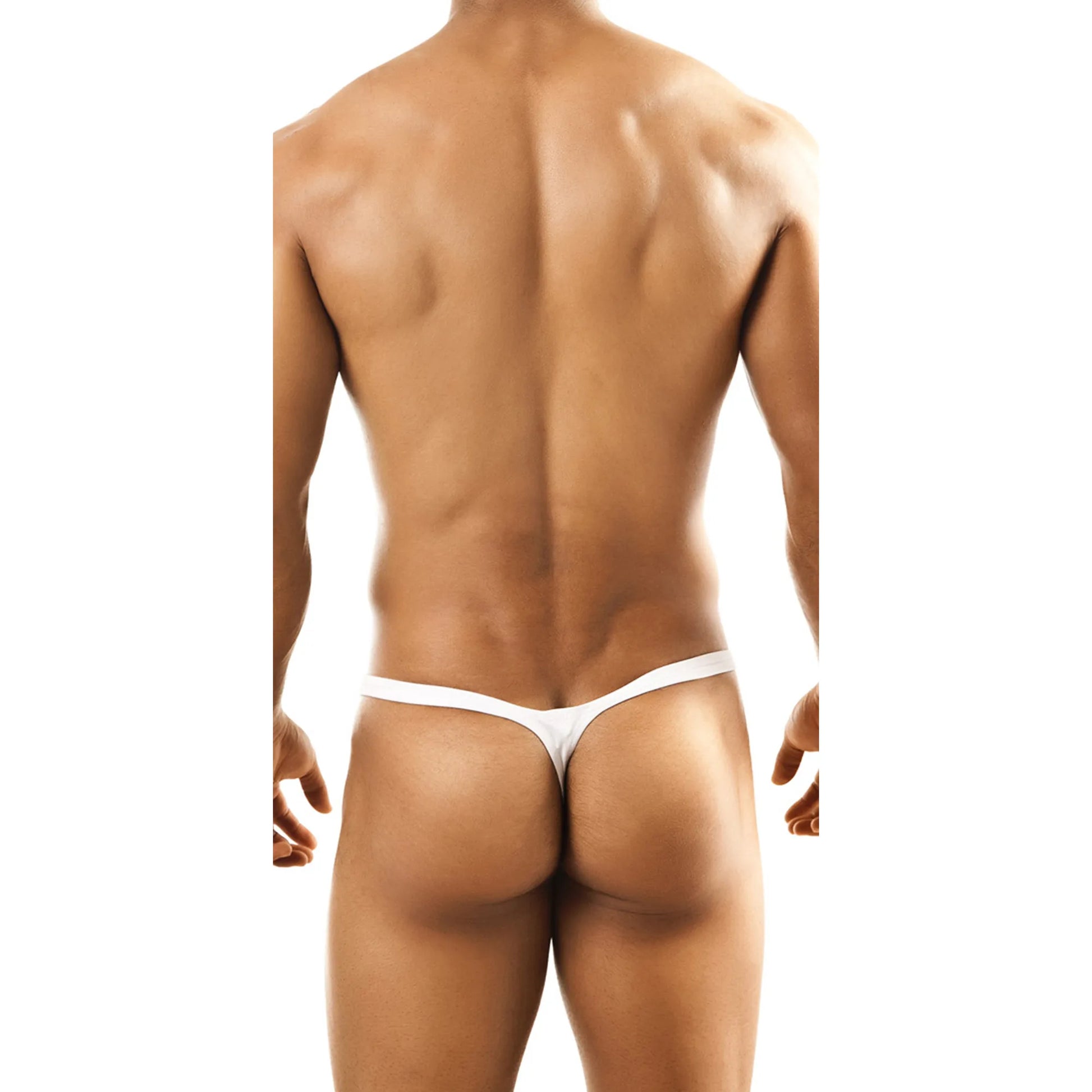  Model wearing a premium men's low-rise G-string thong in black, featuring a minimalist T-back design and a supportive contoured pouch.