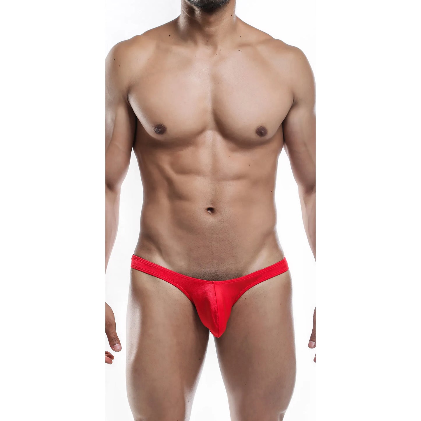  Model wearing a premium men's radiant red G-string thong with a supportive contoured pouch and sleek minimalist waistband for a comfortable fit.