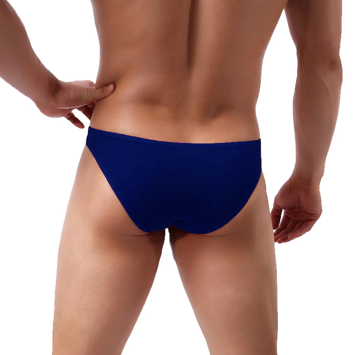 Model wearing premium men's black low-rise bikini briefs featuring a unique red integrated support ring and a contoured pouch for a modern fit.