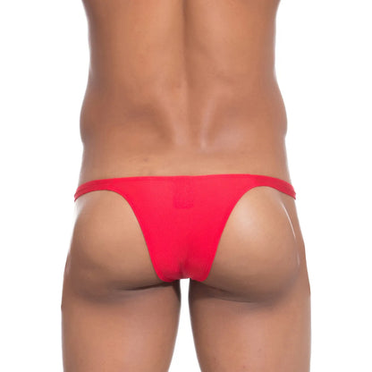 Model wearing a premium men's navy blue micro thong with a sleek low-rise waistband and supportive contoured pouch for an invisible fit under clothing.