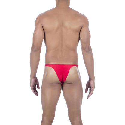  Model wearing premium men's onyx black micro thong with a sleek low-rise waistband and supportive contoured pouch for a seamless fit.