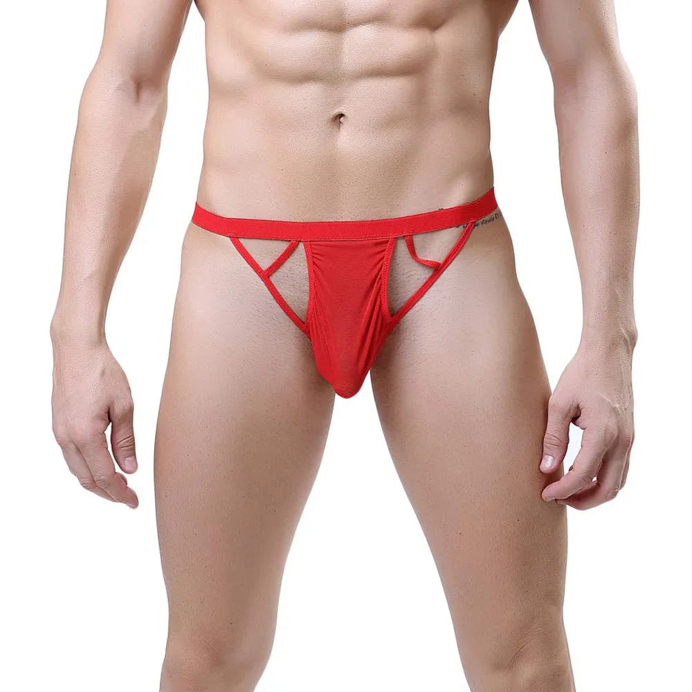 Model wearing premium men's cut-out thong featuring a low-rise waistband and a supportive contoured pouch in a breathable sheer mesh fabric.