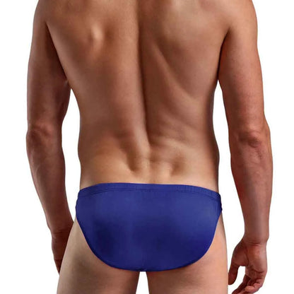  Model demonstrating the quick-release side-clip feature on premium men's black low-rise bikini briefs with a supportive contoured pouch.