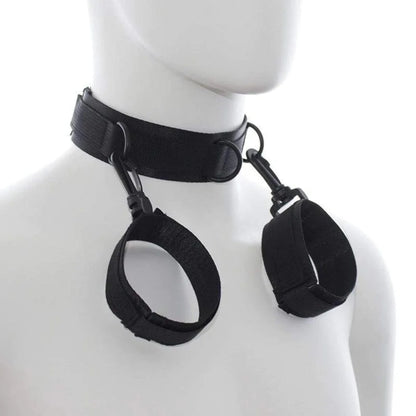 Black adjustable neck collar connected to matching wrist cuffs with durable metal clips.