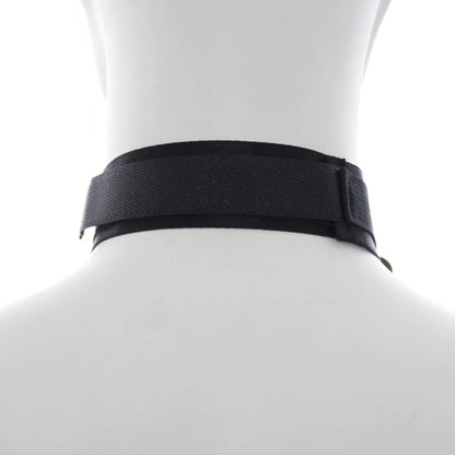 Black adjustable neck collar connected to matching wrist cuffs with durable metal clips.