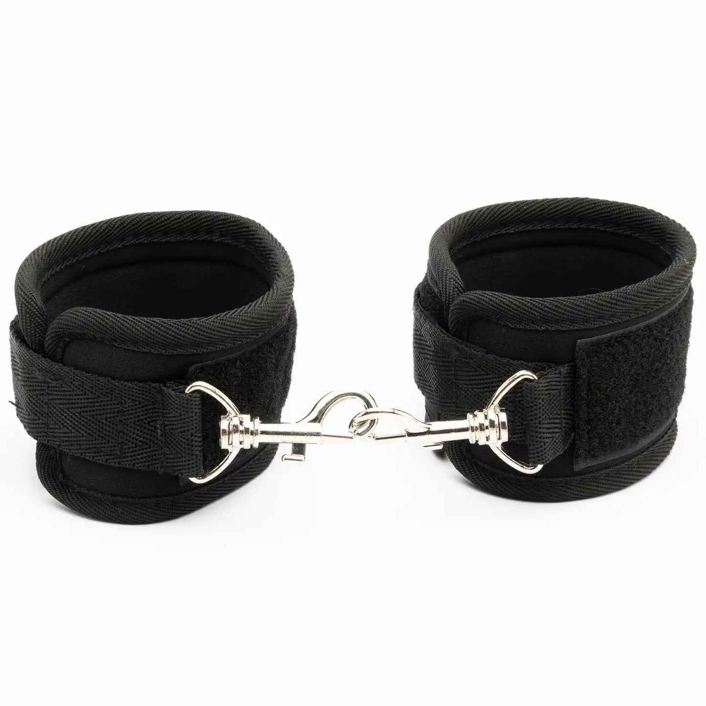 Pair of adjustable padded wrist restraint cuffs connected with a metal lock connector.
