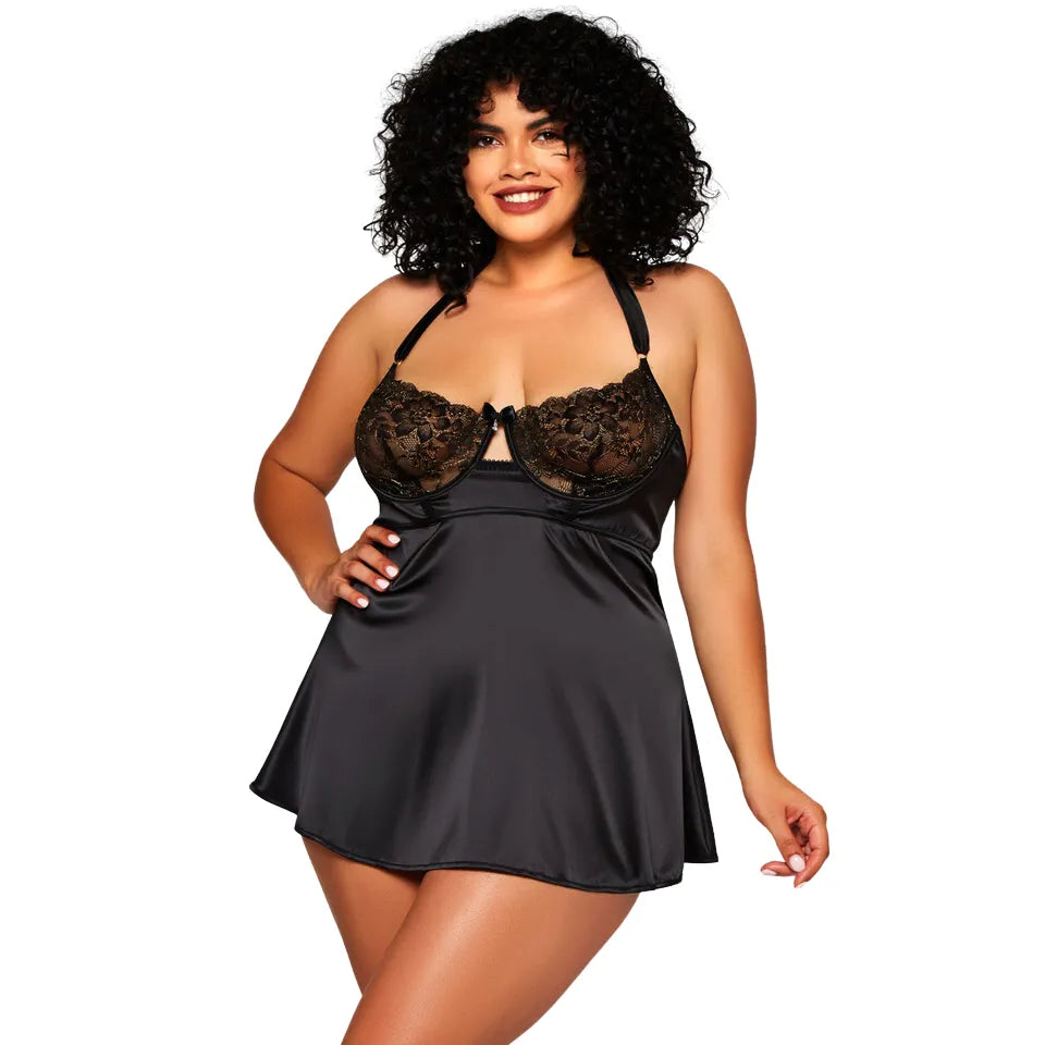 woman wearing black satin lace babydoll nightdress with floral lace cups and flowy silhouette
