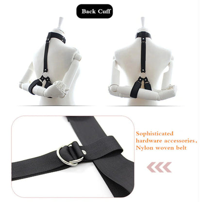 Black collar connected to adjustable wrist cuffs with a chest restraint harness.
