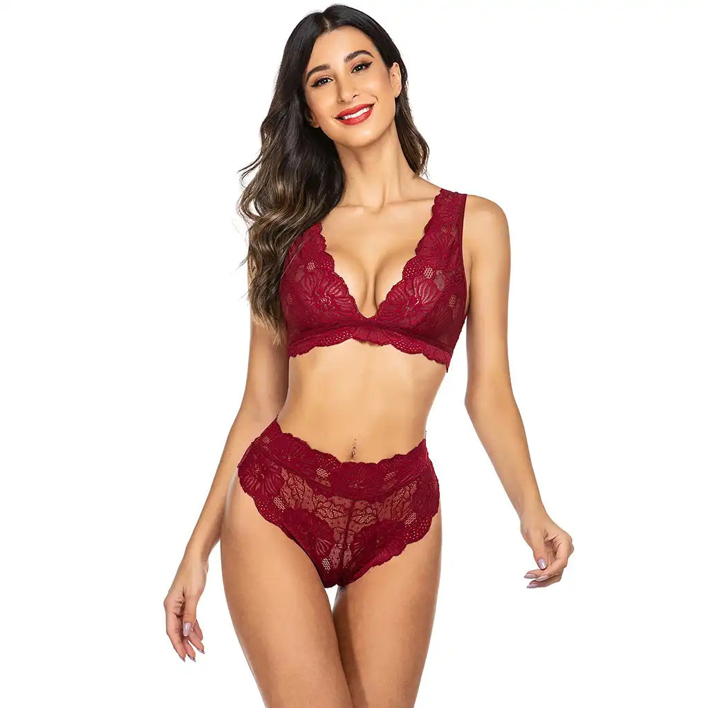 women's black two-piece lingerie set featuring a floral eyelash lace bralette and matching high-waist lace panties.