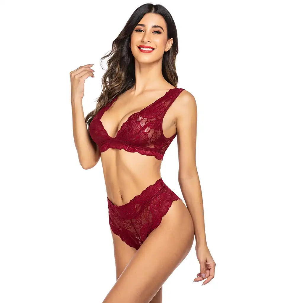 women's black two-piece lingerie set featuring a floral eyelash lace bralette and matching high-waist lace panties.