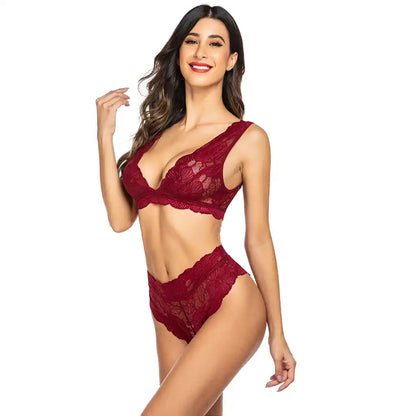 women's black two-piece lingerie set featuring a floral eyelash lace bralette and matching high-waist lace panties.