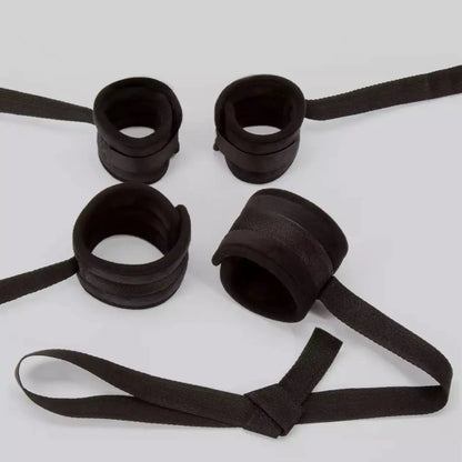 Four nylon restraint straps with adjustable wrist and ankle cuffs for bed attachment.