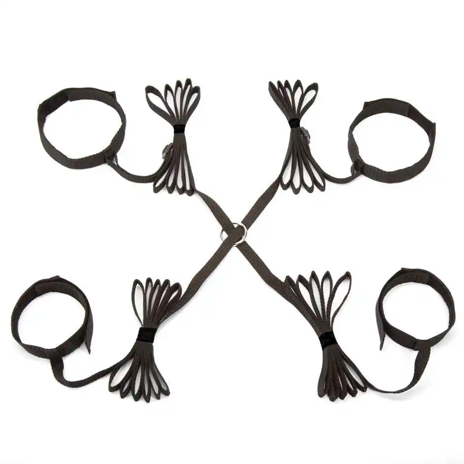 Adjustable full bed restraint set with wrist cuffs, ankle cuffs, and connecting straps.