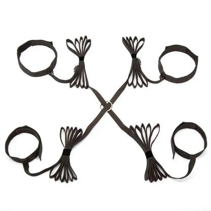 Adjustable full bed restraint set with wrist cuffs, ankle cuffs, and connecting straps.