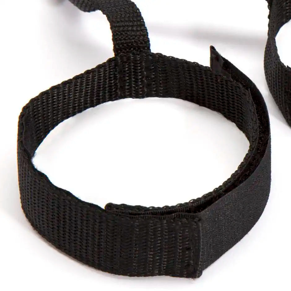 Adjustable full bed restraint set with wrist cuffs, ankle cuffs, and connecting straps.