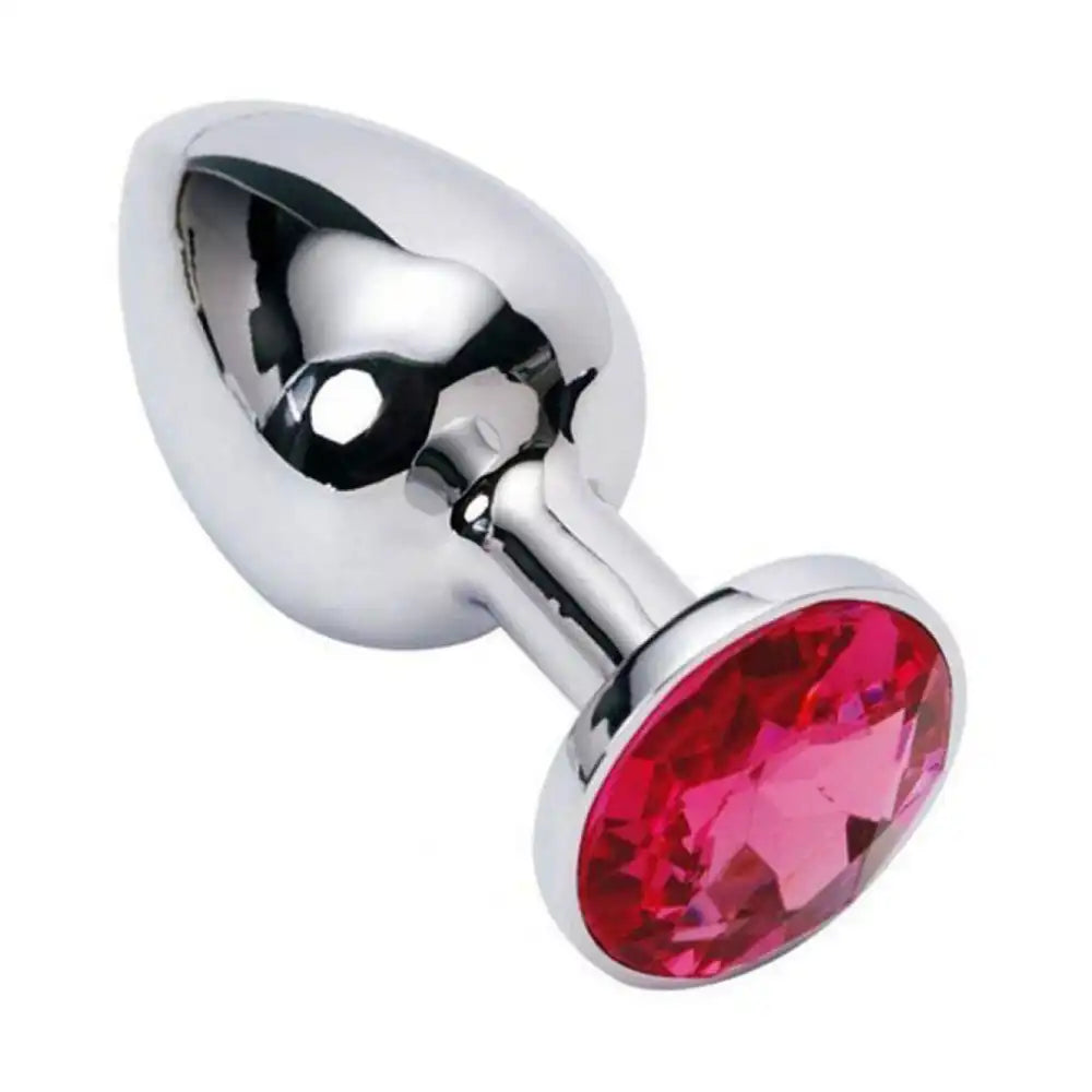 Imported stainless steel metal plug with red crystal handle and polished silver finish.