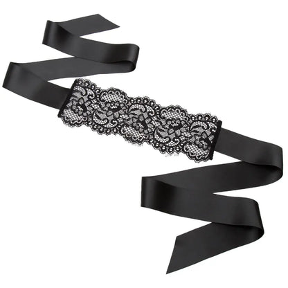 Black floral lace blindfold with satin ribbon tie for elegant sensory play and roleplay.
