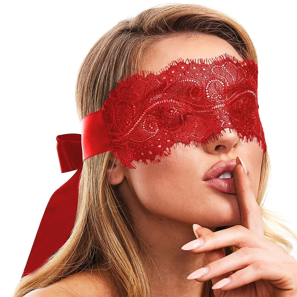 Black floral lace blindfold with satin ribbon tie for elegant sensory play and roleplay.
