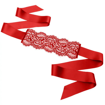Black floral lace blindfold with satin ribbon tie for elegant sensory play and roleplay.