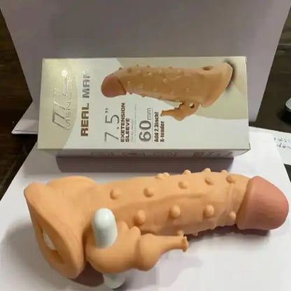Men's extra ribbed elephant textured silicone sleeve with integrated vibration feature.