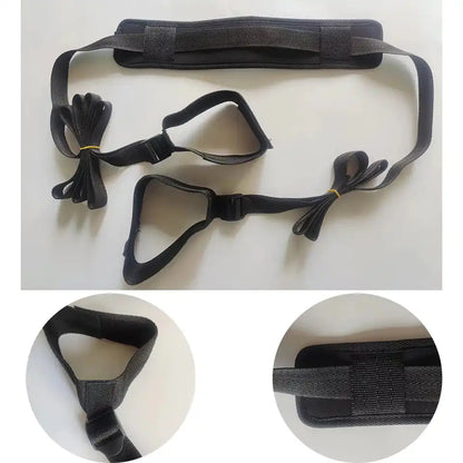 Black neck collar connected to adjustable padded leg cuffs with durable nylon positioning straps.