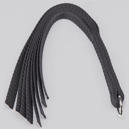Black nylon flogger with multiple flexible woven tails and comfortable wrapped handle.
