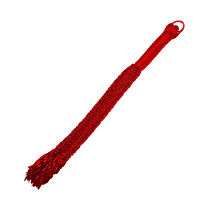 nylon flogger with wrapped handle and multiple flexible tails for roleplay and sensory play.