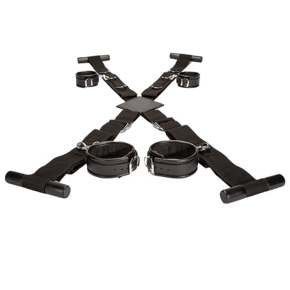 Over-the-door full restraint kit with adjustable wrist and ankle cuffs attached to a door-mounted strap system.
