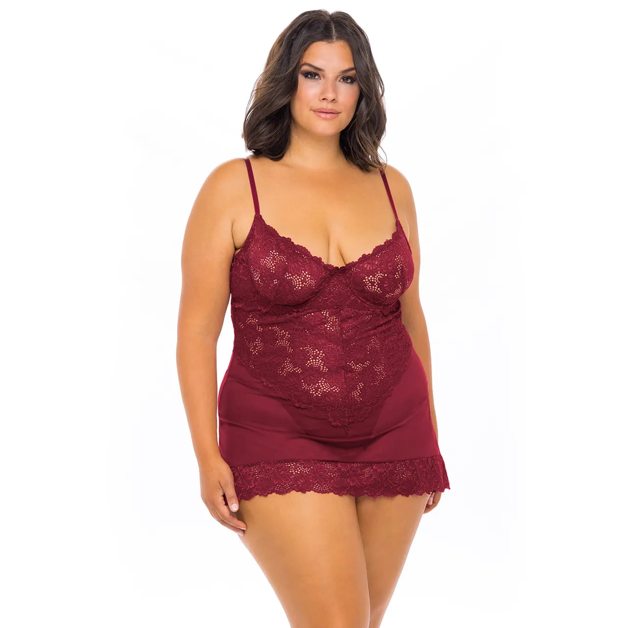 woman wearing  floral lace chemise lingerie with sheer mesh fabric and lace hem detailing
