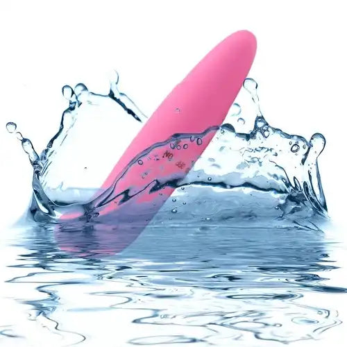 Pink mini battery operated vibrator with compact ergonomic design and portable construction.