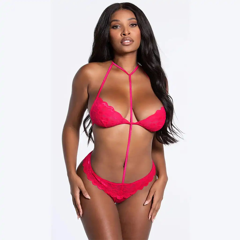 women's hot pink one-piece lingerie teddy featuring a floral lace halter top, vertical center strap, and matching scalloped lace bottom.
