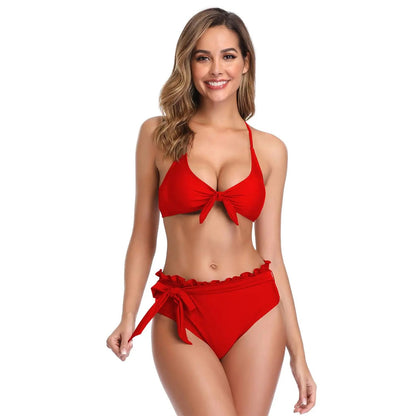 women's two-piece swimwear set in vibrant red, featuring a front-tie halter top and matching high-waisted bottoms with ruffle details.