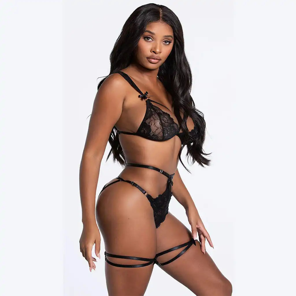 women's one-piece lingerie bodysuit featuring a sheer mesh fabric, deep V-neckline, and high-leg silhouette.
