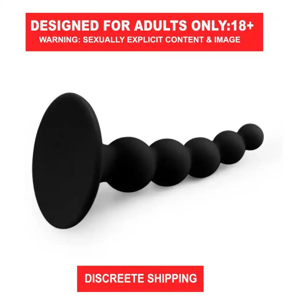 Black silicone anal beads plug with graduated bead design and suction cup base.
