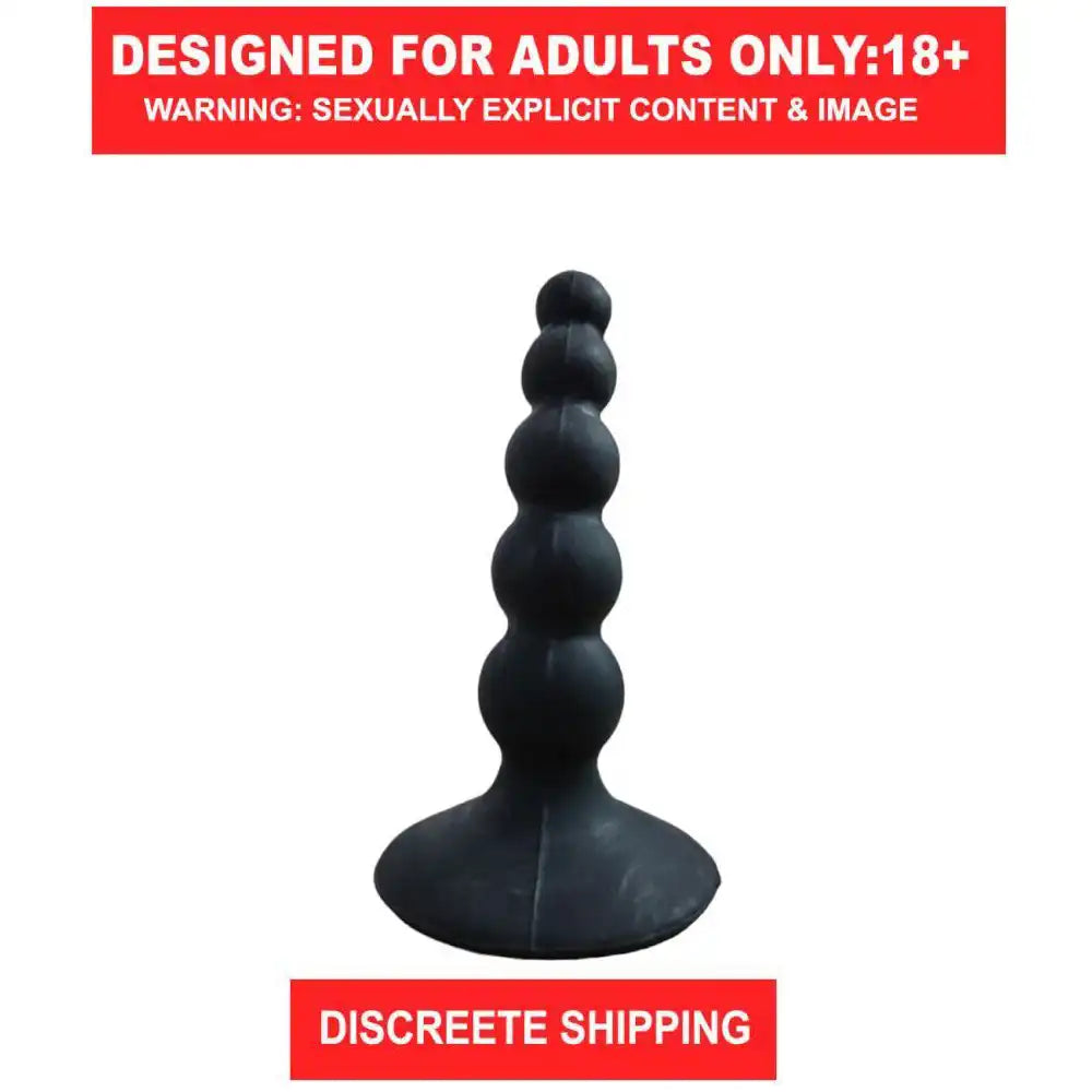 Black silicone anal beads plug with graduated bead design and suction cup base.