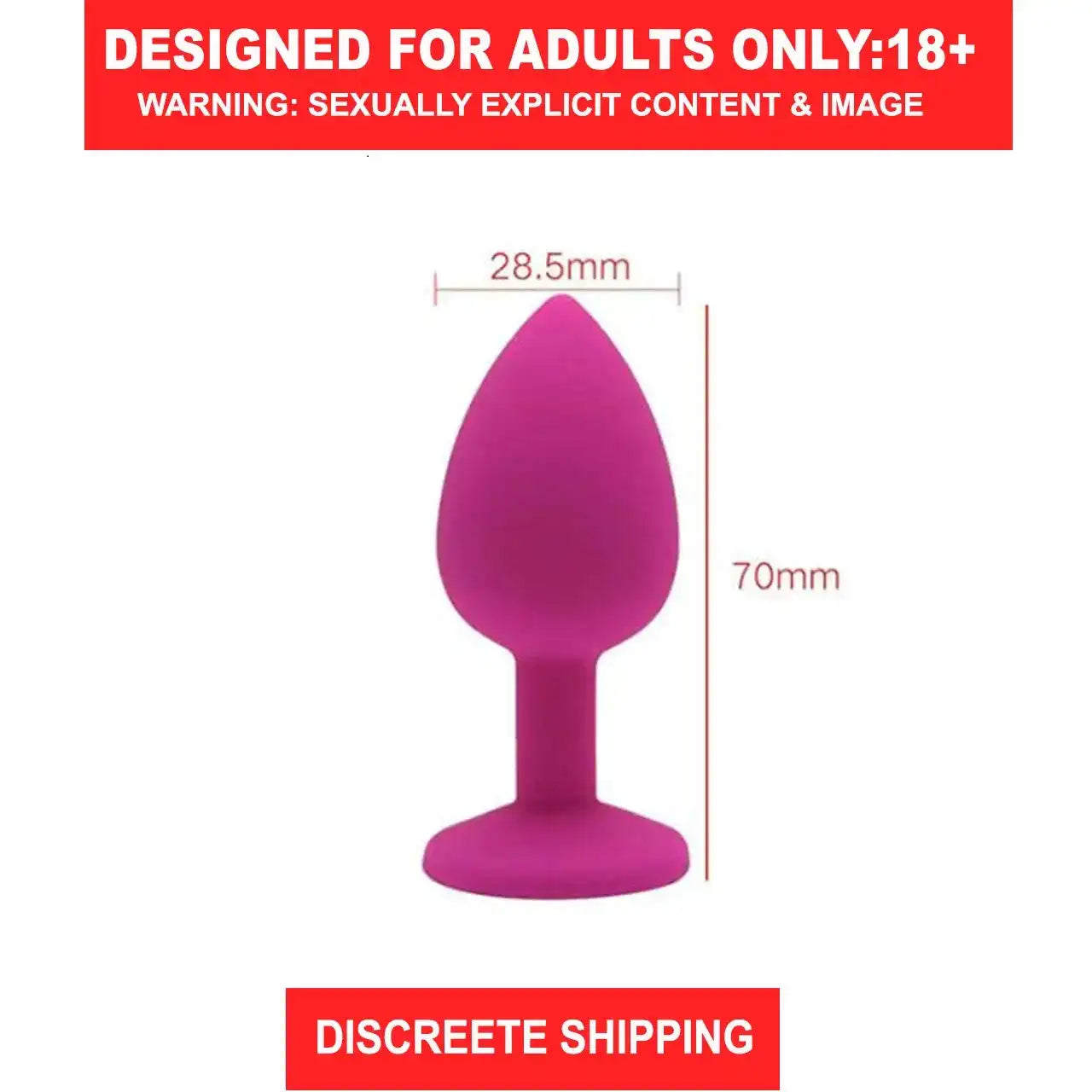 Red silicone butt plug with sparkling crystal gem base and smooth body-safe finish.