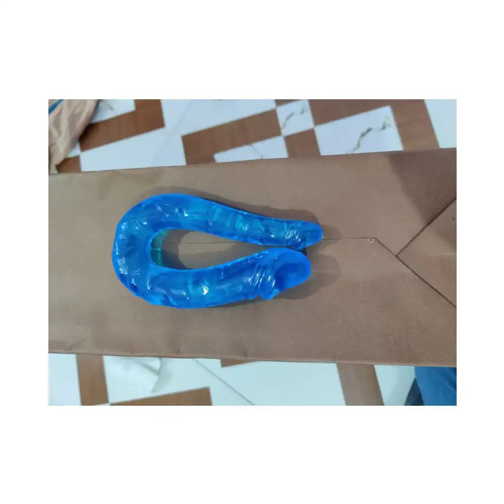 Realistic double headed massager for women with flexible dual-end blue design and ergonomic structure.