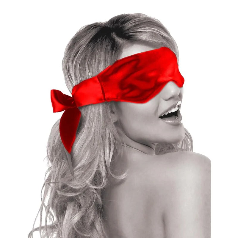 Scarlet red satin blindfold with soft eye coverage and adjustable ribbon tie closure.