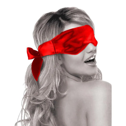 Scarlet red satin blindfold with soft eye coverage and adjustable ribbon tie closure.