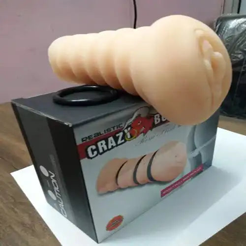 Soft silicone ribbed massager sleeve for men with adjustable pressure rings and reusable design.