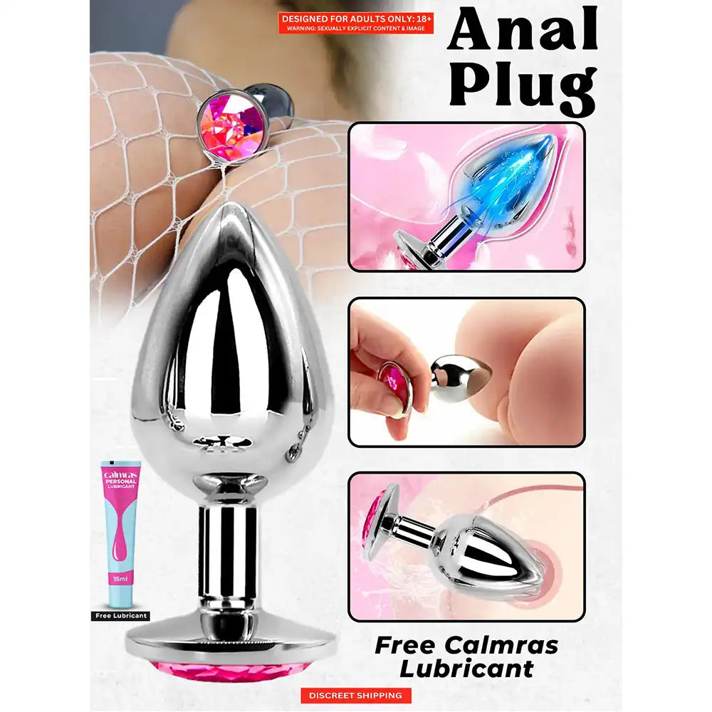 Stainless steel butt plug with mirror-polished finish and pink crystal gem base.