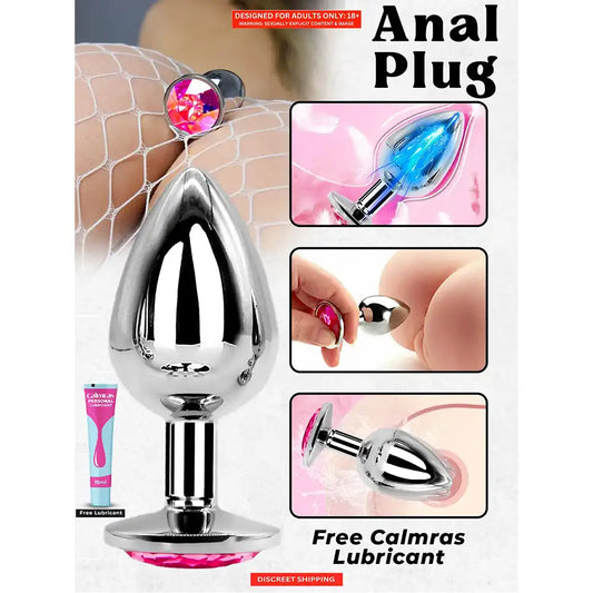 Stainless steel butt plug with mirror-polished finish and pink crystal gem base.