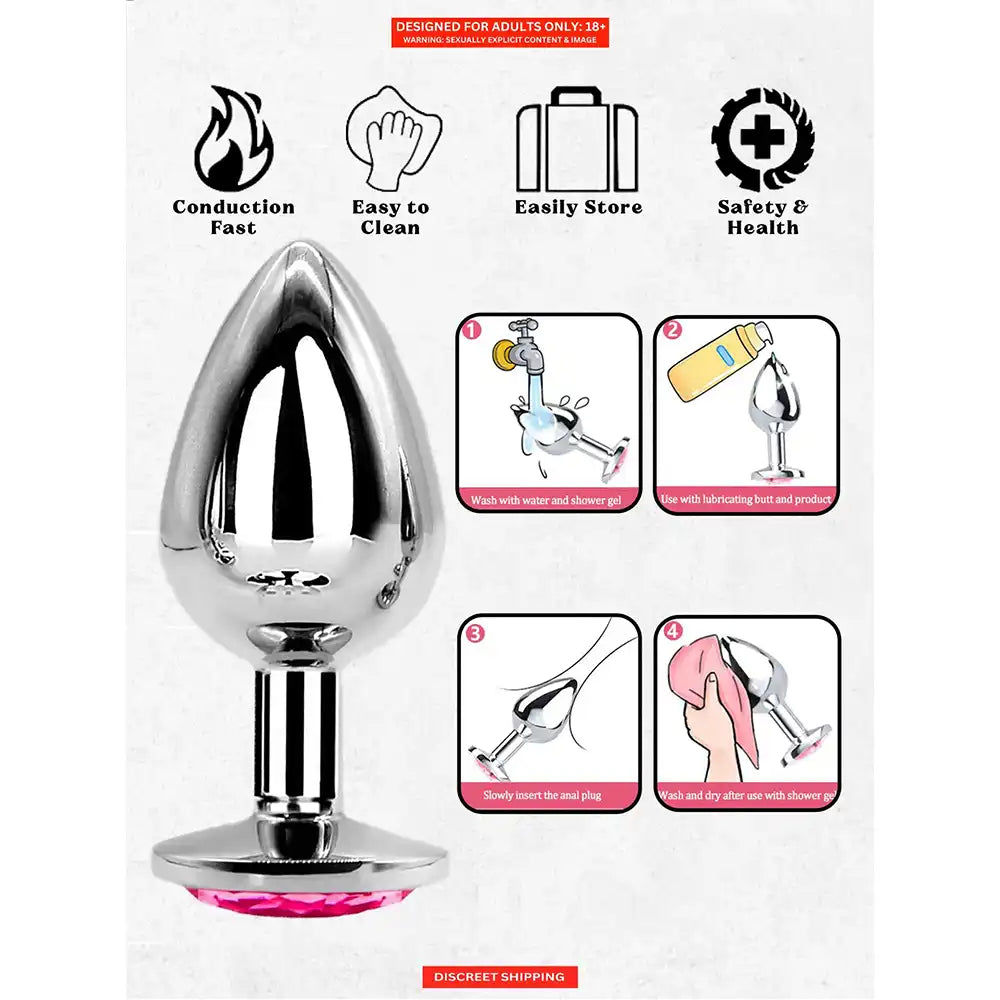 Stainless steel butt plug with mirror-polished finish and pink crystal gem base.