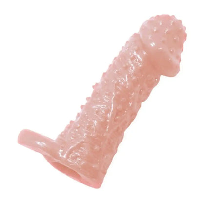 Textured dotted silicone sleeve with flexible construction and ergonomic design.